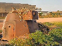 Restes de véhicules blindés abandonnés par les troupes O.N.U.